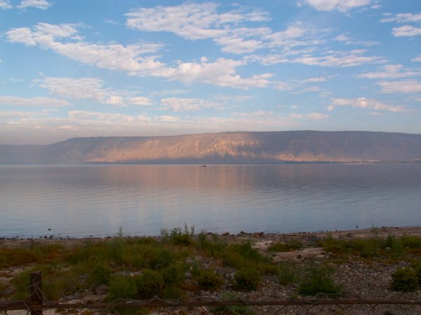 The sun setting on the western hills of the Sea of Galilee The sun setting on the western hills of the Sea of Galilee